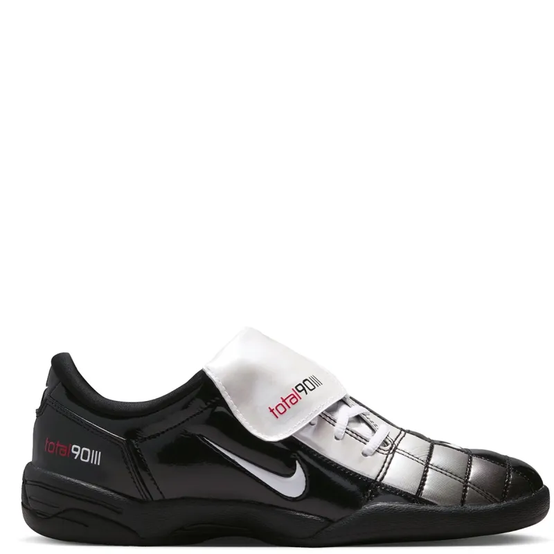 Nike Women’s Total 90 SE medial side view with white Swoosh and stitched paneling