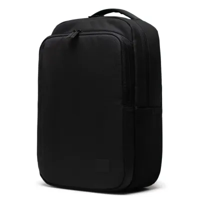 Side angle of black backpack highlighting structured shape and zipper pocket