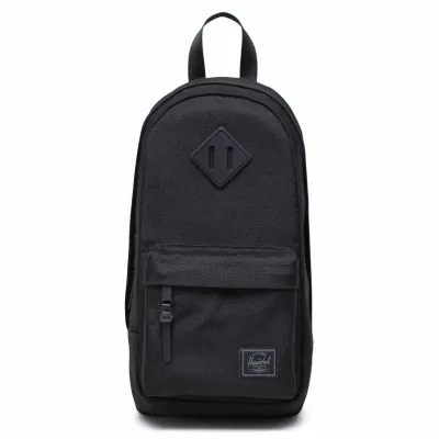 Front view of Herschel Heritage shoulder bag in black tonal with signature diamond detail