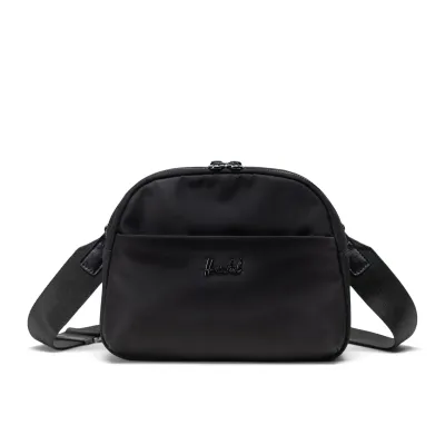 Front view of Herschel Thalia crossbody bag in black tonal with metal logo