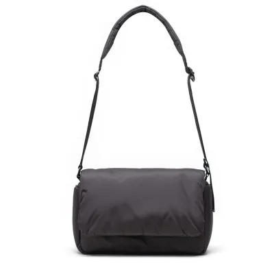Herschel Cloudform crossbody bag in black with padded body and flap closure