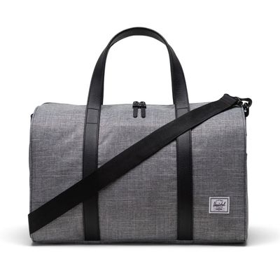 Front view of Herschel Novel duffle bag in Raven Crosshatch with black handles and strap