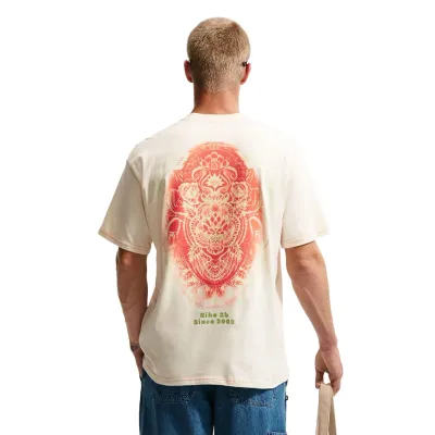 Back view of Nike SB Som Tum Tee in coconut milk with large red and green graphic print.