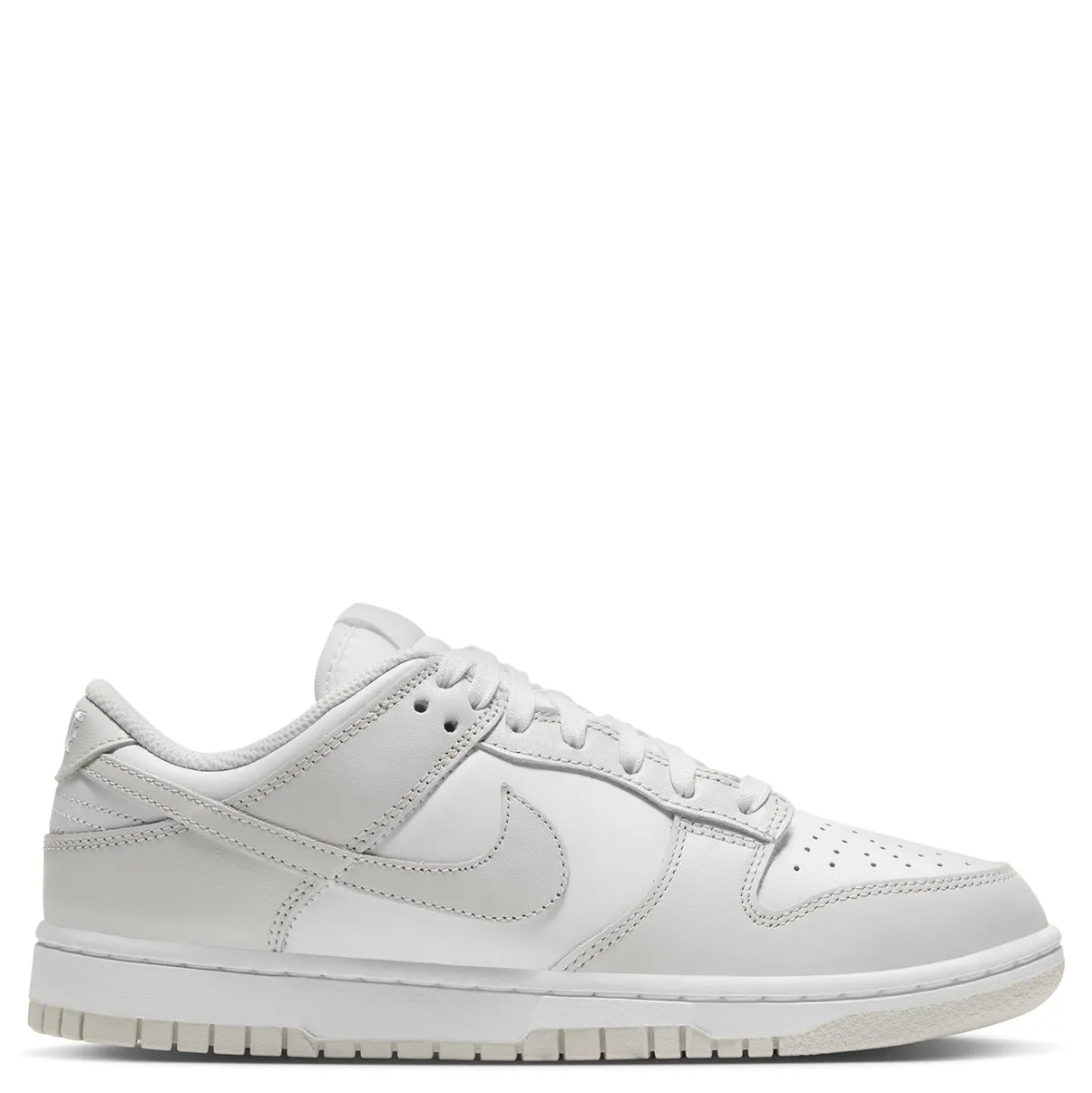 Medial side view of Nike Dunk Low in white and light grey with clean stitched overlays