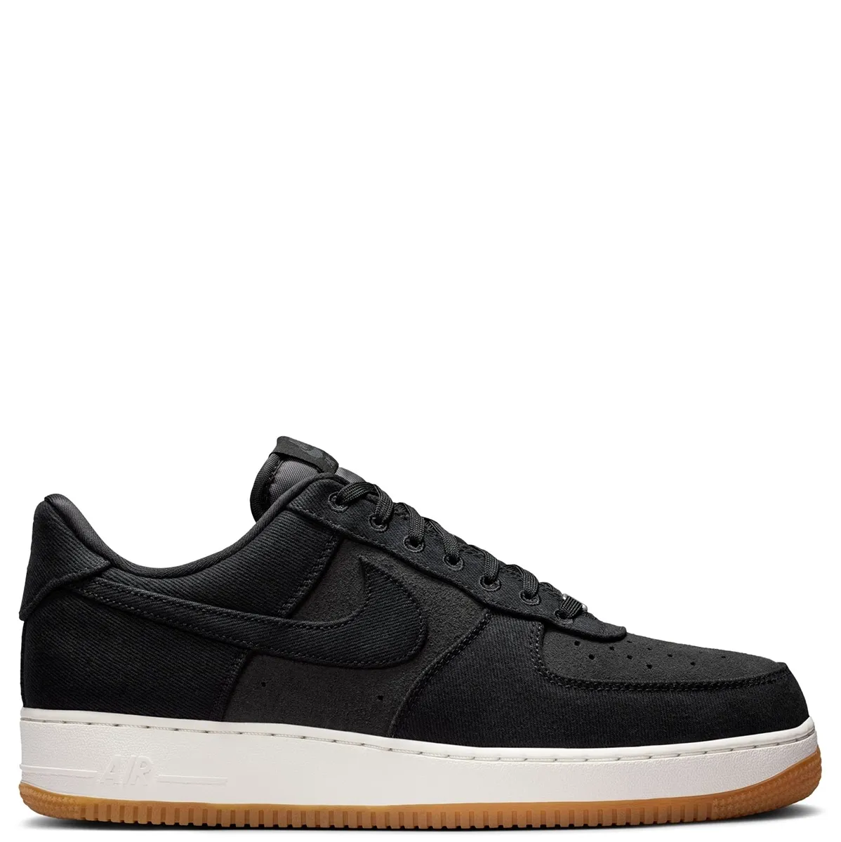 Medial side view of Nike Air Force 1 in black denim with stitched overlays and classic low-top silhouette