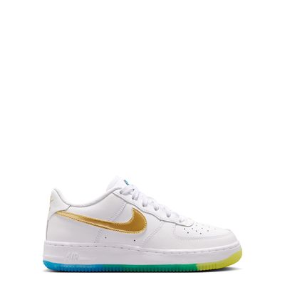 Medial side profile of Nike Air Force 1 in white leather with clean panels and gradient outsole detail