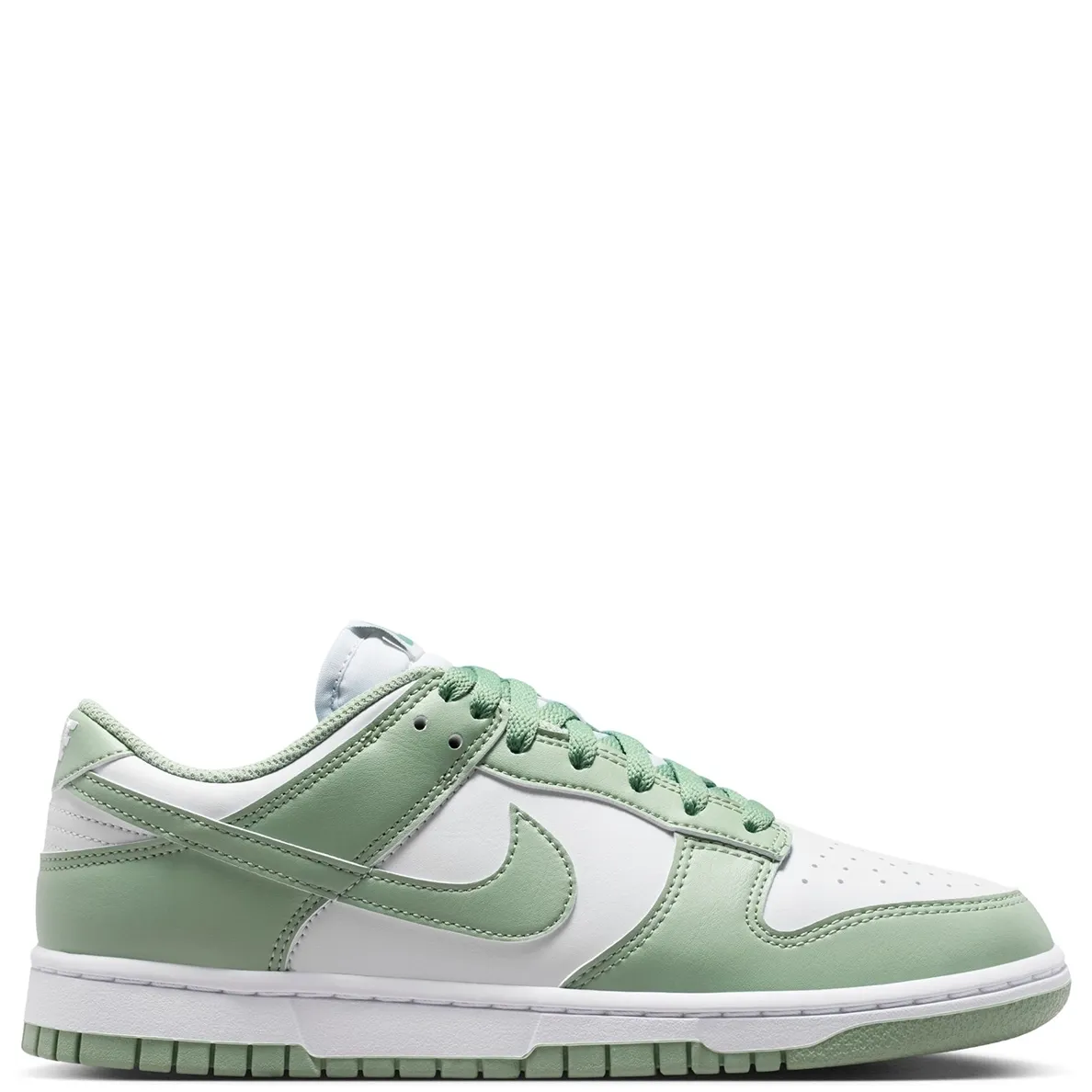 Medial side view of Nike Dunk Low with clean white leather underlays and green accents