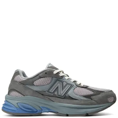 New Balance ABZORB 2010 harbor grey sneaker lateral view with blue midsole accents