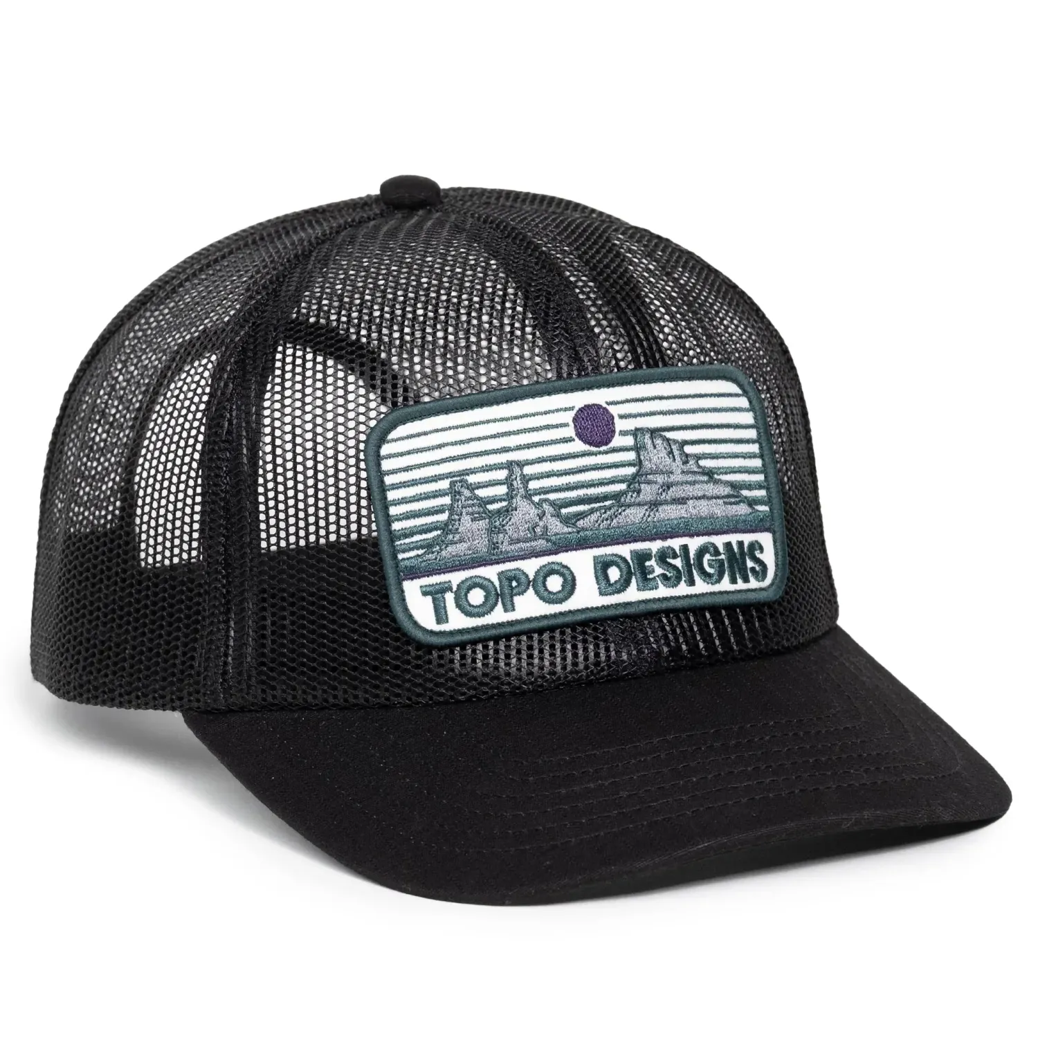 Angled front view of TOPO DESIGNS Desert Dusk trucker hat with flat brim and mesh crown