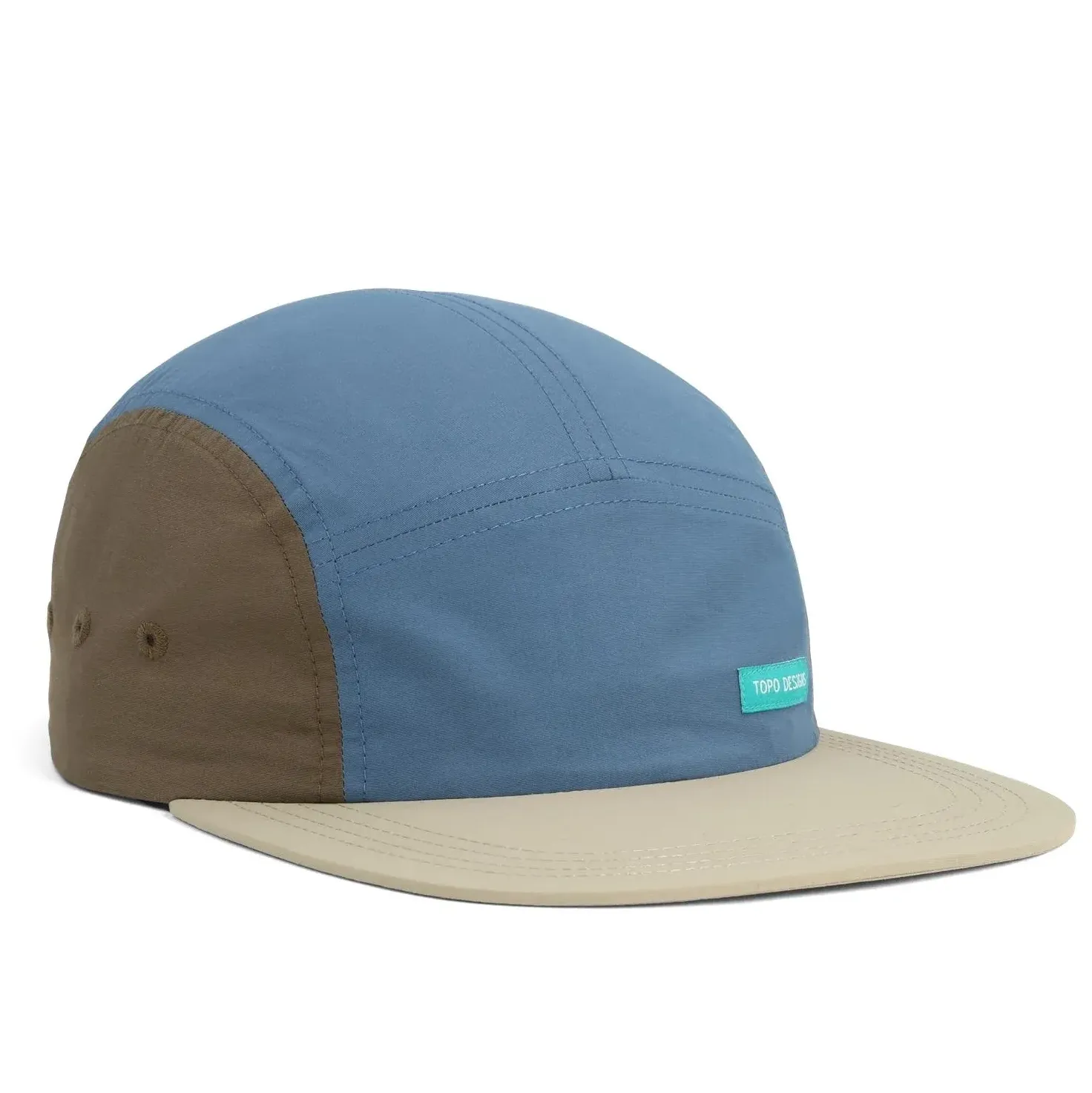 Angled side view of TOPO DESIGNS nylon camp hat with flat brim and color-block design