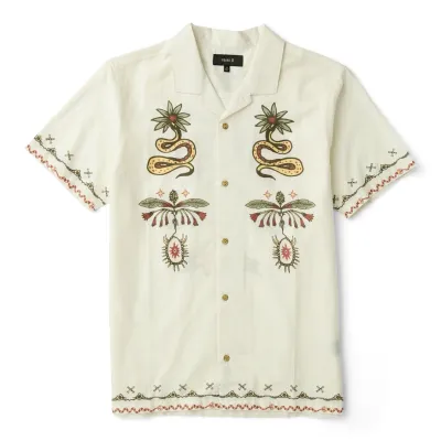 Front flat lay of ROARK Gonzo Short Sleeve Button Up Shirt in Unbleached with custom artwork
