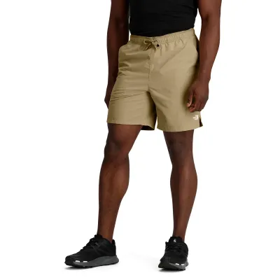 Model wearing The North Face Action 2.0 Shorts with split hem detail