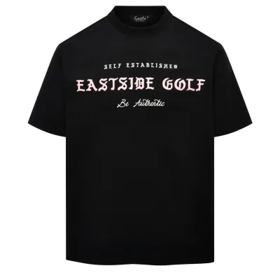 Front view of the Eastside Golf Headline Tee in Black with oversized graphic text