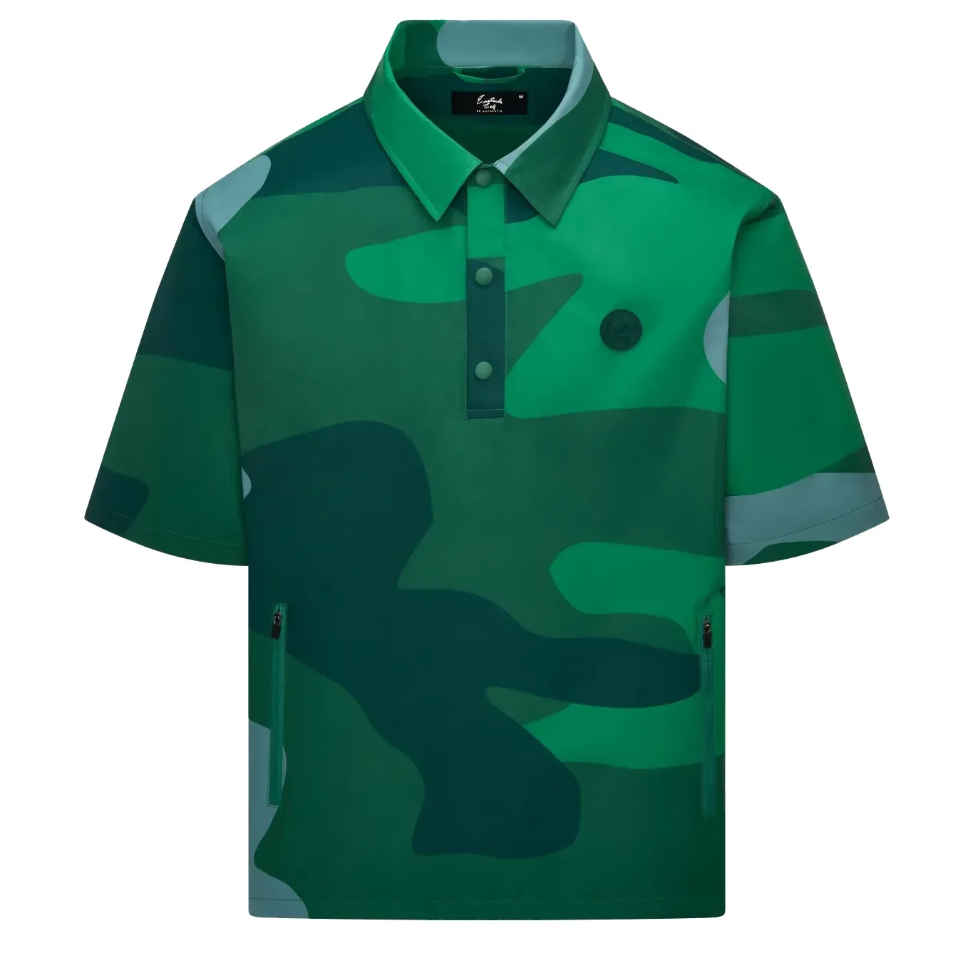 Front view of the Eastside Golf Breaker Polo in verde camo with zip pockets and oversized fit