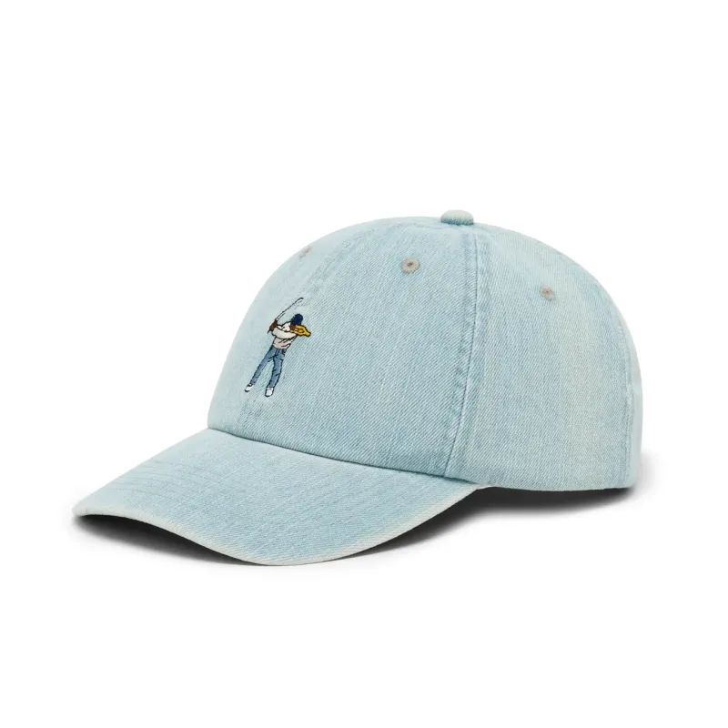 Angled front view of the Eastside Golf Denim Swingman Dad Hat in light indigo denim