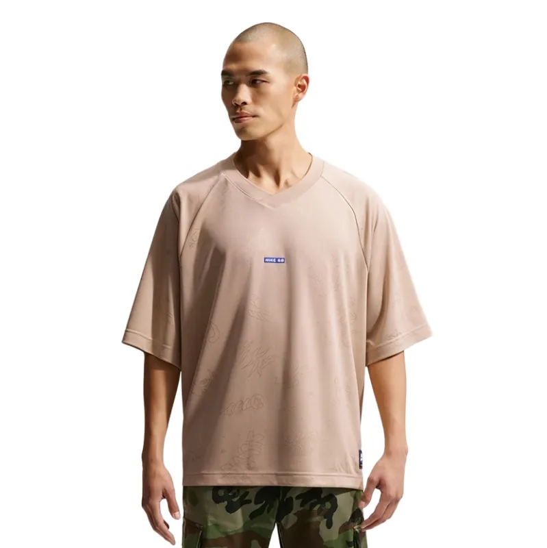 Front view of Nike SB Jacquard Doodle Jersey featuring relaxed fit and woven doodle texture