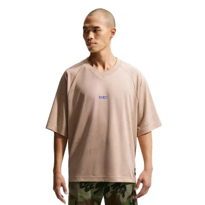 Front view of Nike SB Jacquard Doodle Jersey featuring relaxed fit and woven doodle texture