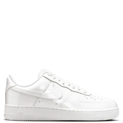 Full lateral side view of white patent leather Nike Air Force 1 sneakers
