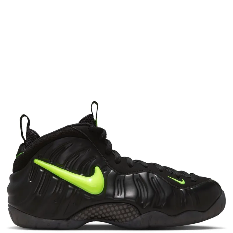 Opposite side profile of Nike Air Foamposite Pro with oversized Voltage Yellow Swoosh