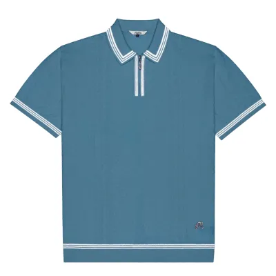 Flat lay front view of Malbon Golf Navarro Polo in Aegean Blue