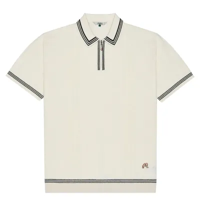 Flat lay front view of Malbon Golf Navarro Polo in Cream with contrast trim