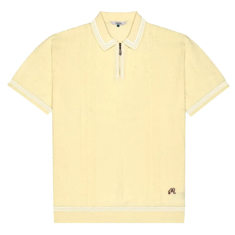 Flat lay front view of Malbon Golf Navarro Polo in Wax Yellow