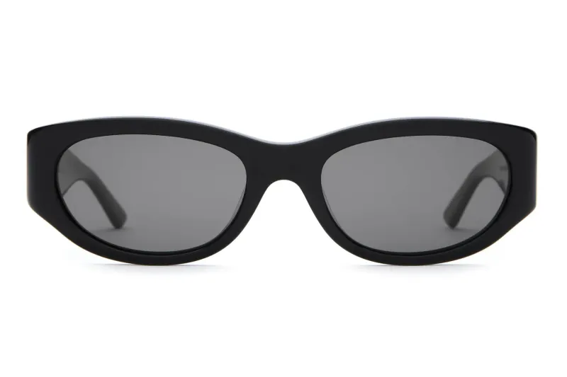 Front view of Crap Eyewear The Funk Punk wraparound sunglasses in black with polarized grey lenses.