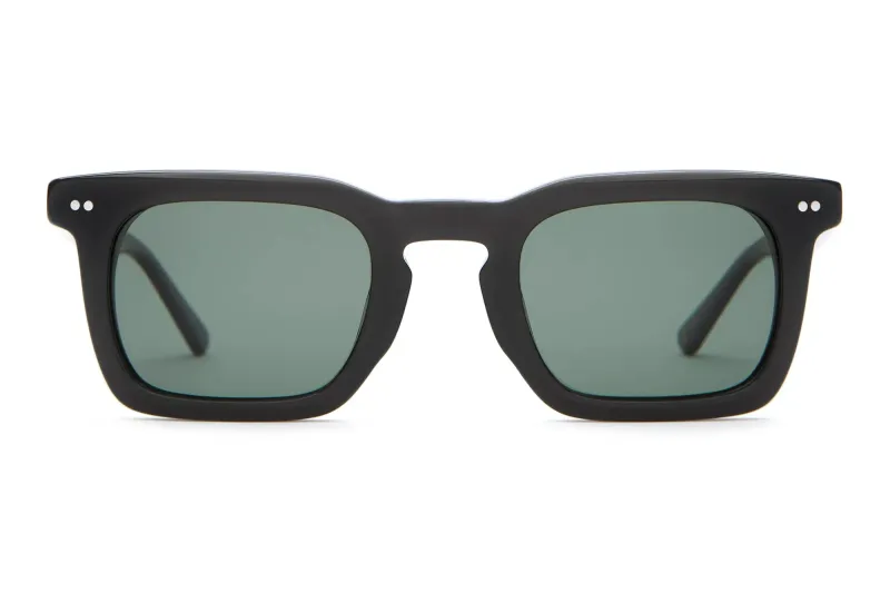Front view of Crap Eyewear The Radio Haze sunglasses with a square keyhole silhouette and green-tinted polarized lenses.