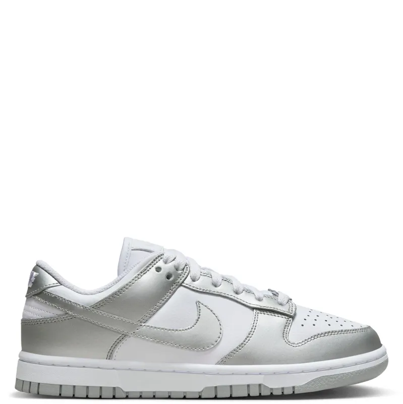 Lateral side profile of Nike Women’s Dunk Low in White and Metallic Silver