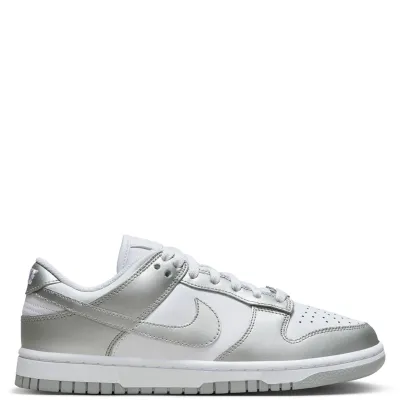 Lateral side profile of Nike Women’s Dunk Low in White and Metallic Silver