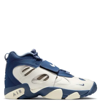 Medial side view of Nike Air Diamond Turf II with leather overlays and Air branding.