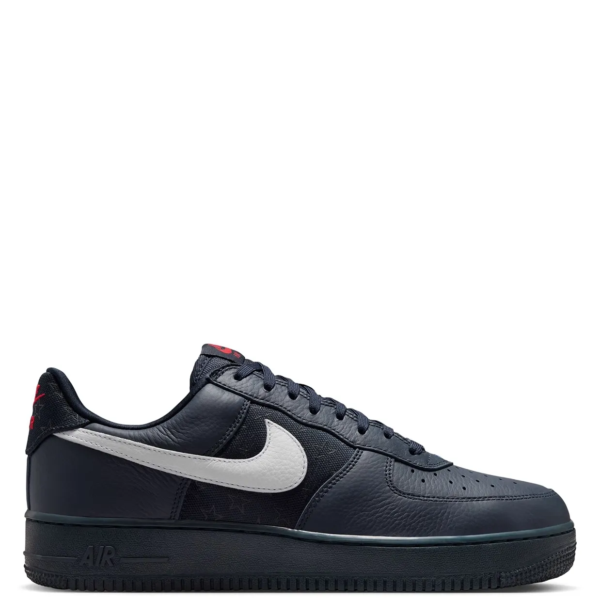 Medial side profile of the Nike Air Force 1 Low Retro Team USA featuring navy leather construction and classic AF1 tooling.