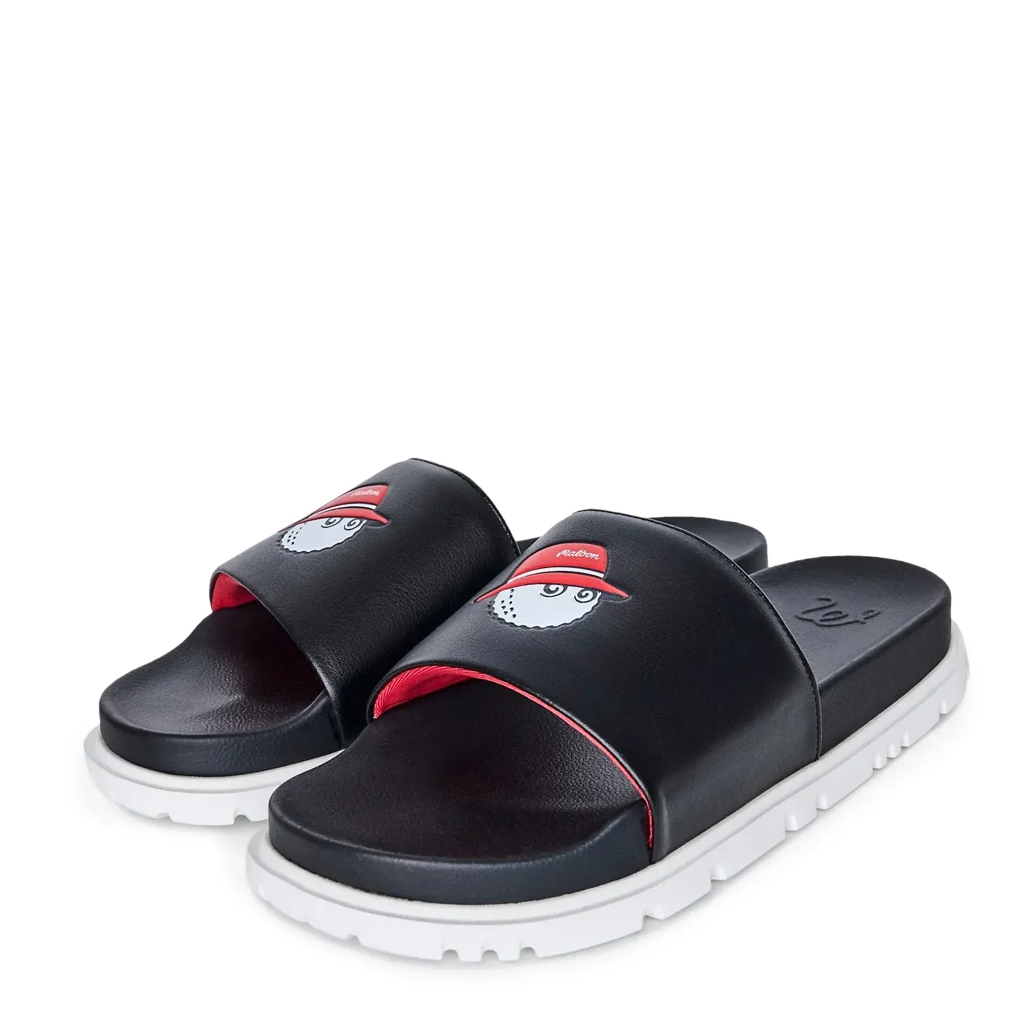 Three-quarter view of the pair showing the Black/Red colorway and comfort-focused design.