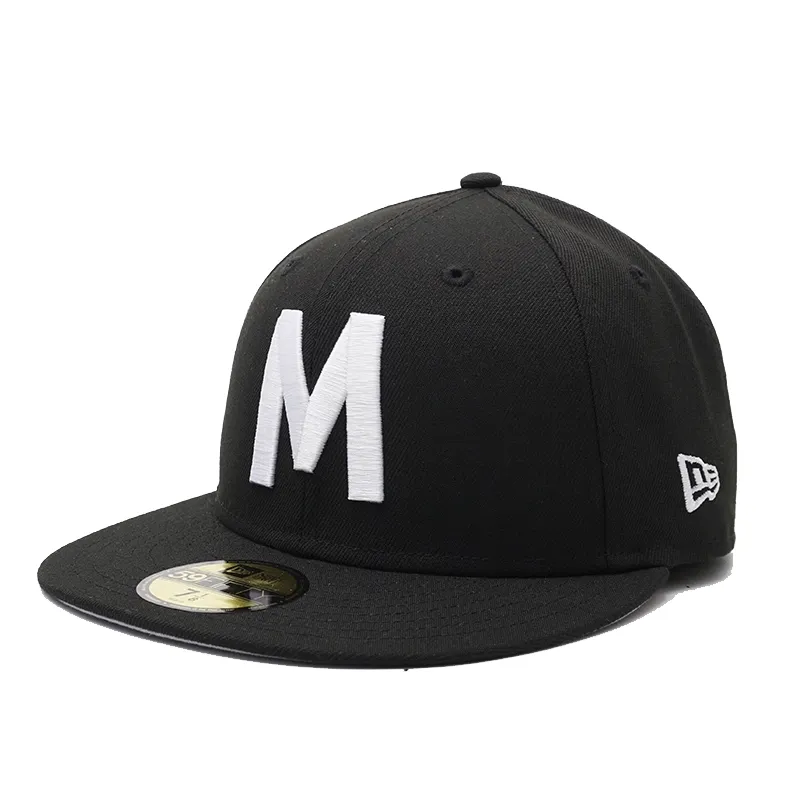 Angled front view of New Era Milwaukee Bears 59FIFTY fitted hat in black with white embroidered M logo