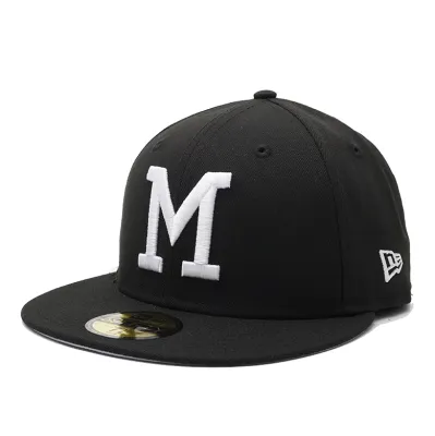 Angled front view of Milwaukee Brewers black fitted cap with raised white M logo