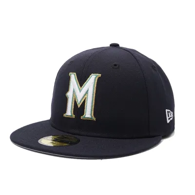 Angled front view of New Era Milwaukee Brewers 90’s M 59FIFTY fitted hat in navy