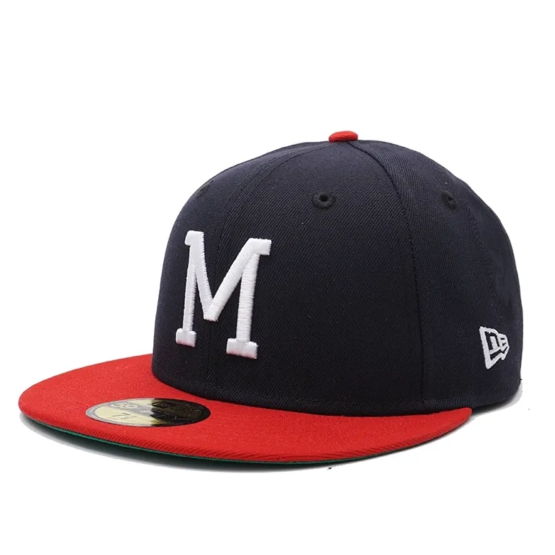 New Era Milwaukee Braves 59FIFTY fitted hat in navy and red angled front view