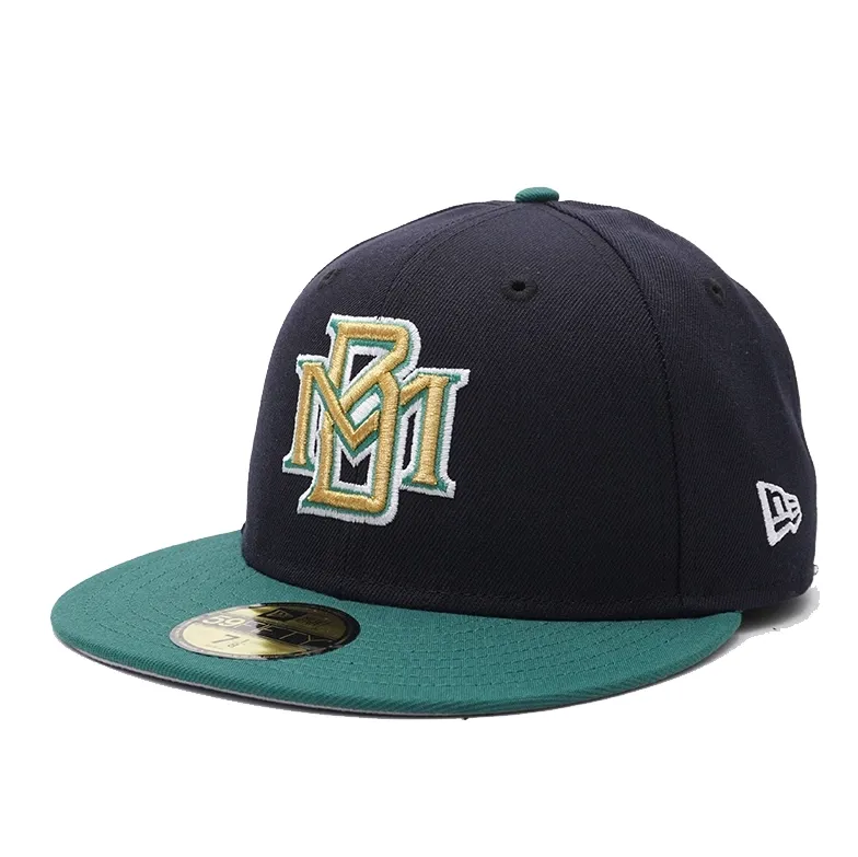Angled front view of Milwaukee Brewers navy and green fitted cap with retro MB logo