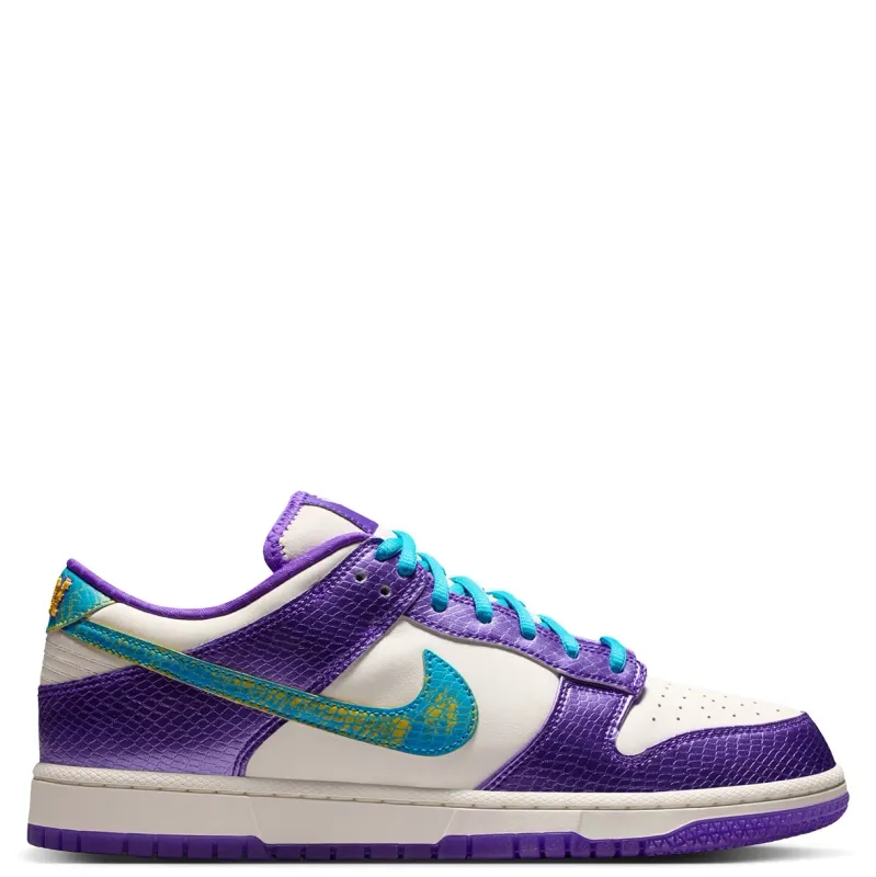 Medial side profile of Nike Dunk Low Protro Draft Pack in purple and sail.