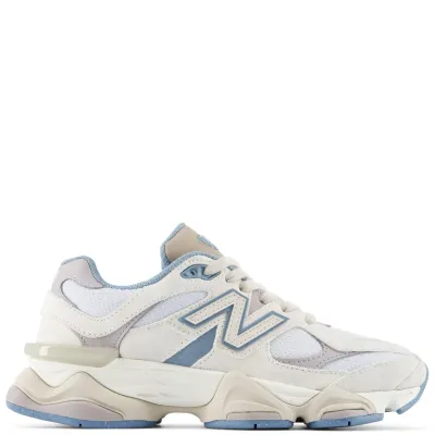 Side profile of the New Balance 9060 sneaker in Zinc Blue and Sea Salt featuring suede overlays, breathable mesh panels, and 