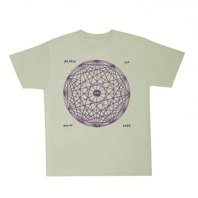 The Quiet Life Middle of Now Here T-shirt in bay green with geometric globe graphic and purple front print.