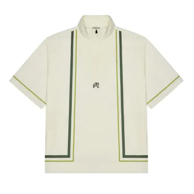 Front flat lay view of the Malbon Golf Playa Windshirt in Cream with green contrast piping and quarter-zip collar.