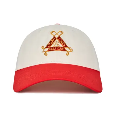 Malbon Golf Trinity Dad Hat in Cream featuring embroidered Cuban Links Golf Club artwork and a contrast red curved brim.