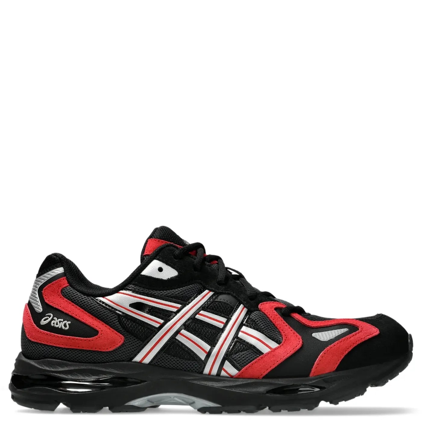 Right side profile of the ASICS GEL-K1011 featuring silver ASICS branding, red overlays, and visible GEL cushioning.