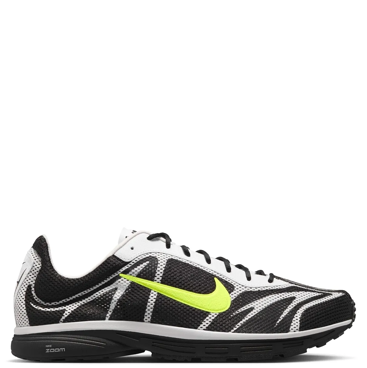 Medial side profile of the Nike Zoom Streak 3 with lightweight mesh construction.