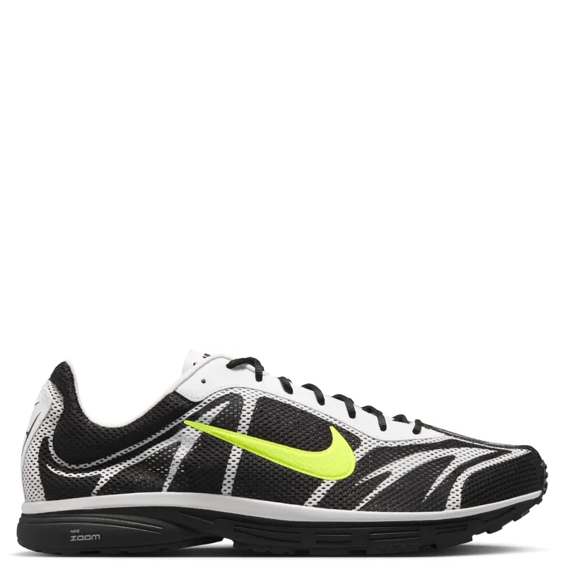 Medial side profile of the Nike Zoom Streak 3 with lightweight mesh construction.