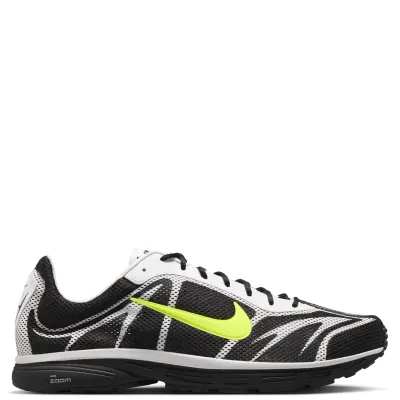 Medial side profile of the Nike Zoom Streak 3 with lightweight mesh construction.