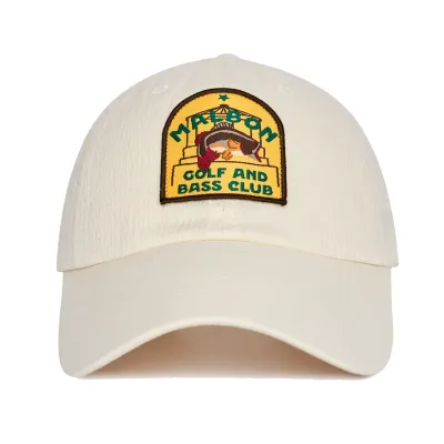Front view of the Malbon Golf Bass Club Dad Hat in Ivory showing the colorful Malbon Golf and Bass Club patch.