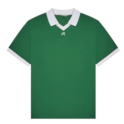 Malbon Golf Barrio Polo in Garden Green shown from the front with white collar and chest logo.