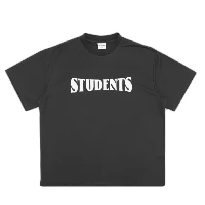 Front view of the Students Golf Oaklawn Mesh Tee in Black with bold Students chest graphic.